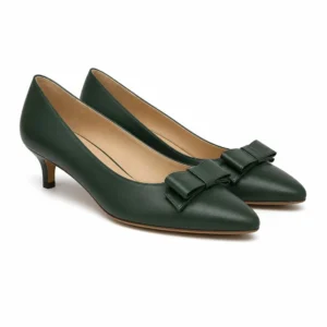 Private label bow detail kitten heel pump in forest green, shown in a front three-quarter hero view for brands, wholesalers, retailers, importers and B2B footwear sourcing.
