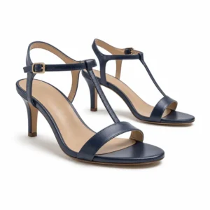Private label T Bar ankle strap dress sandal in a deep navy studio presentation, shown from a front three-quarter angle for brands, wholesalers, retailers, importers and B2B footwear sourcing.