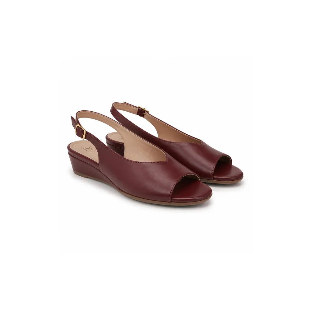 Private label low wedge slingback sandal in burgundy studio presentation, main product view for footwear brands, wholesalers, importers and B2B sourcing teams.